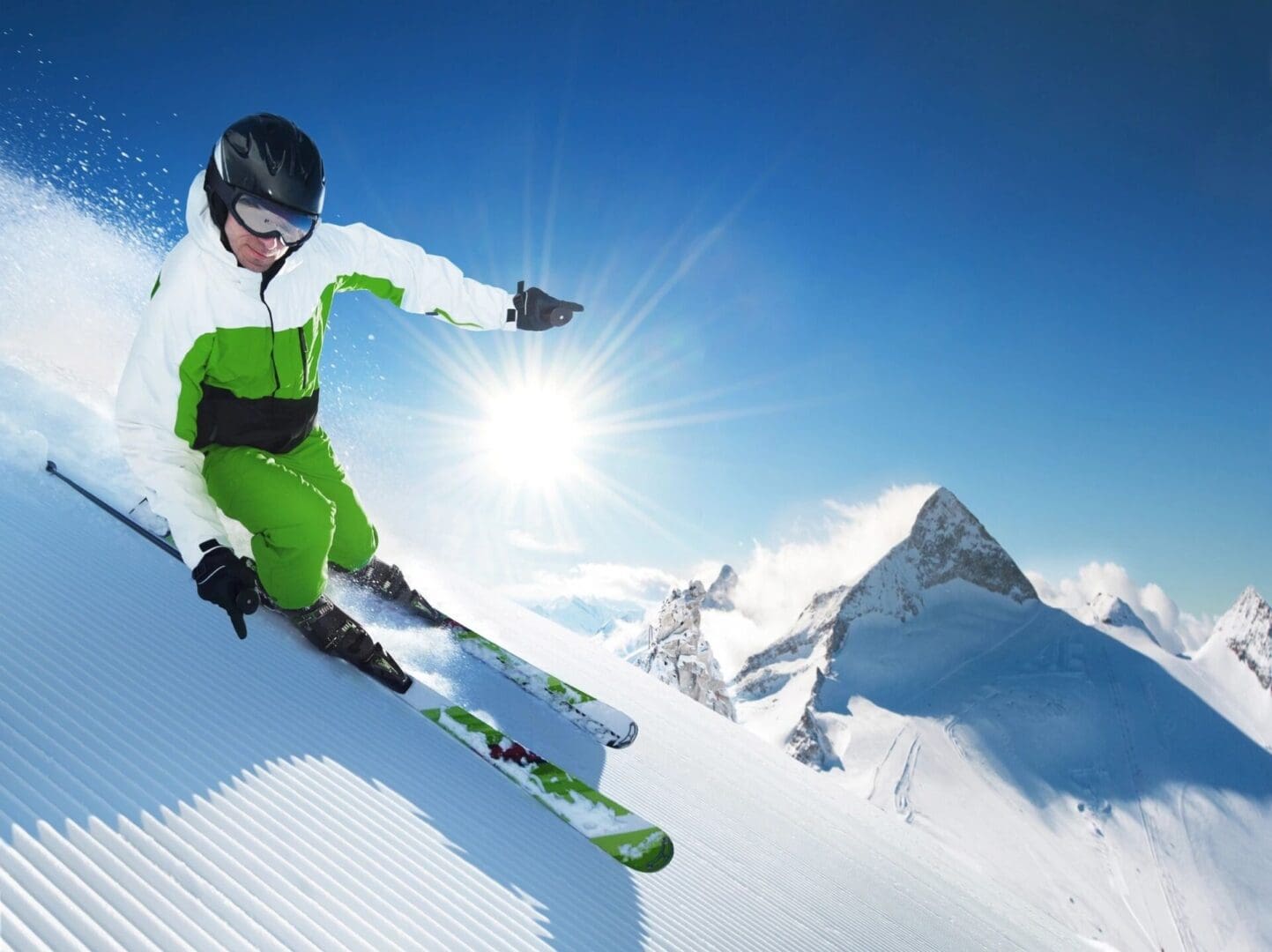 A person skiing down the side of a mountain.